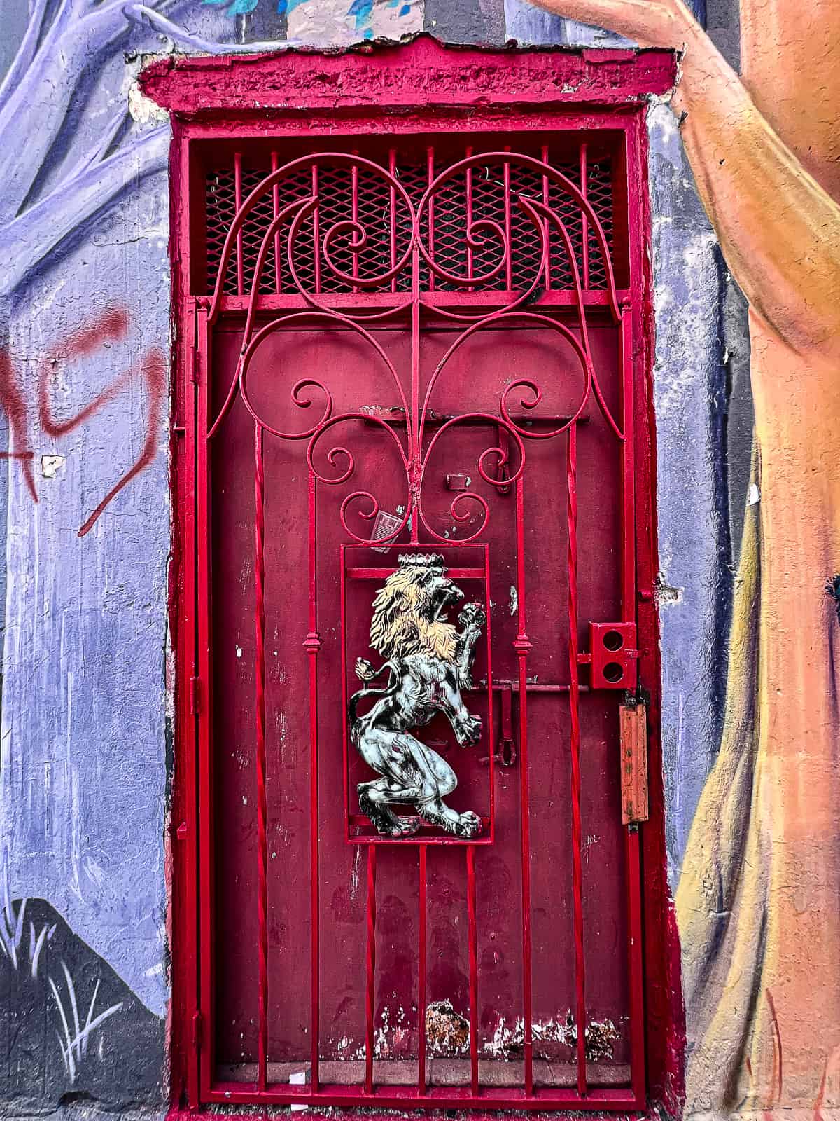 Door in Santurce San Juan surrounded by a painted mural