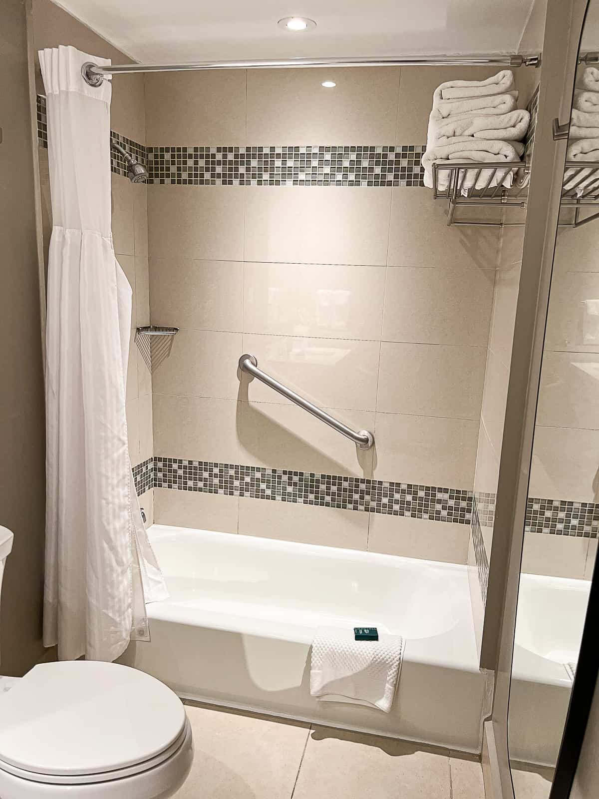 Shower and bath inside Caribe Hilton Suites