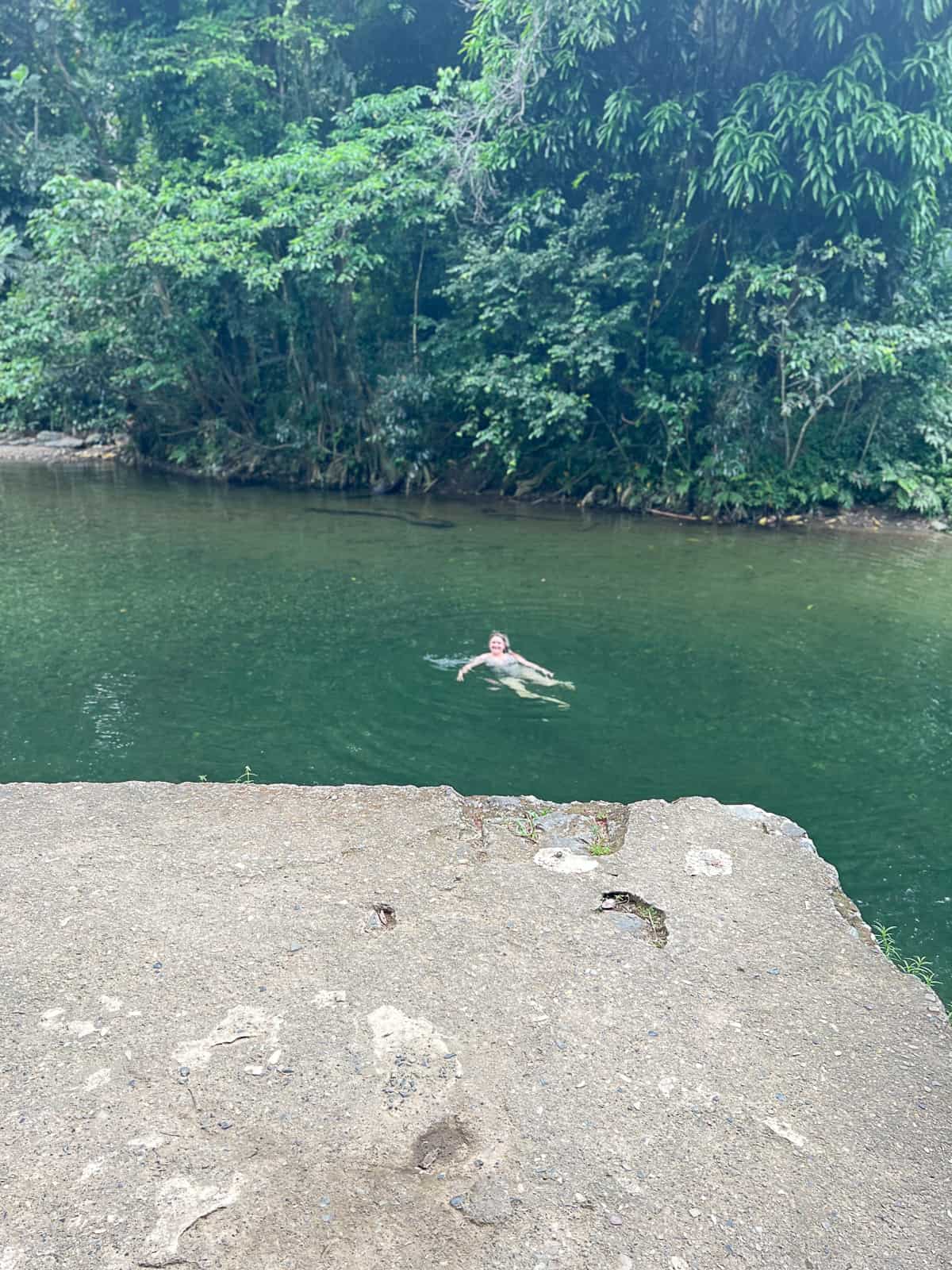 Tourist Swimming El Yunque Puerto Rico