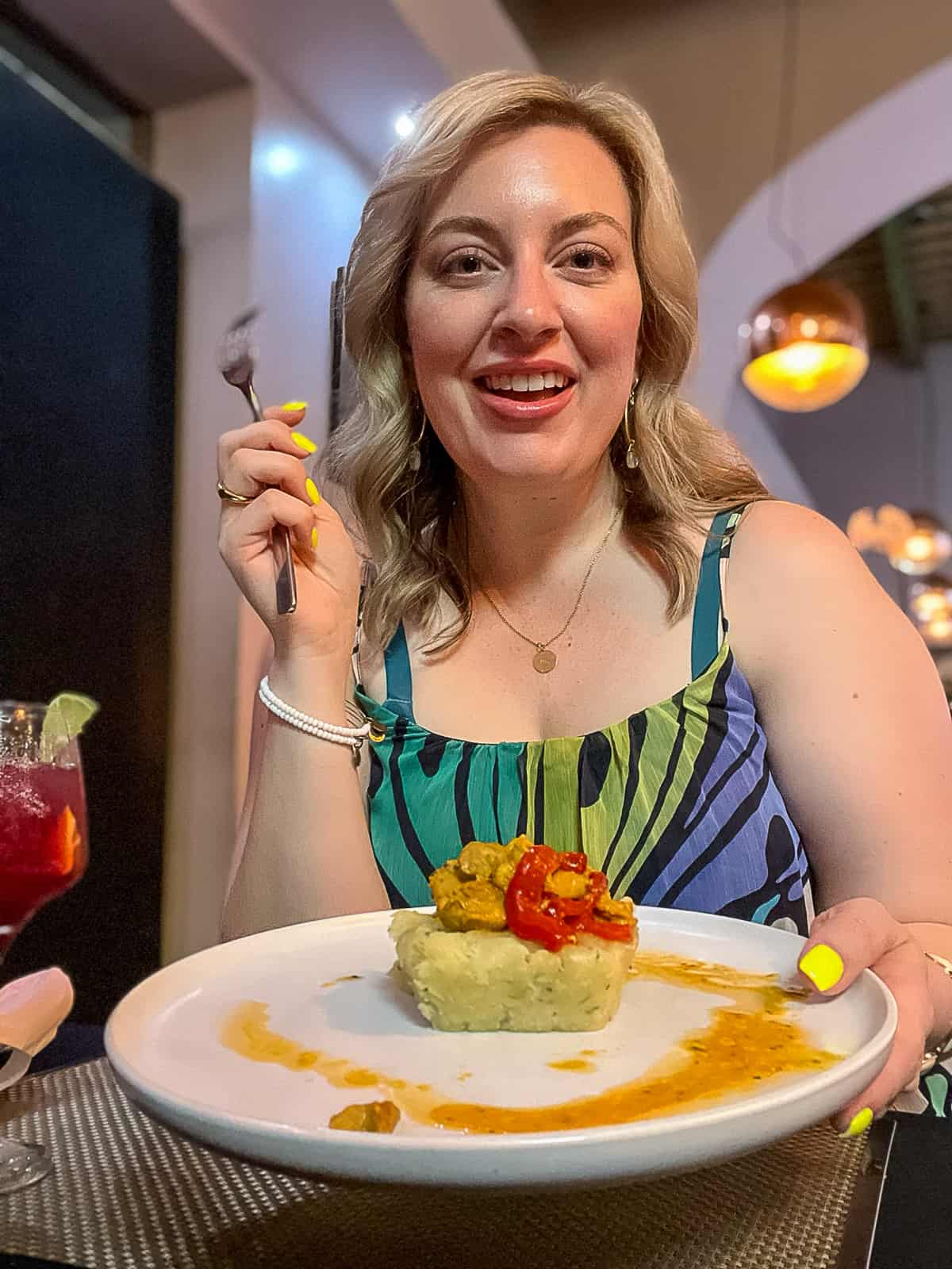 Travel Blogger eating Mofongo Puerto Rico Cuisine