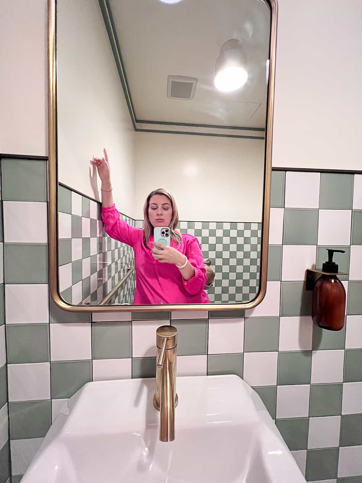 In the bathroom selfie with Jenna Passaro Travel Food Blogger inside La Pecora Bianca NYC