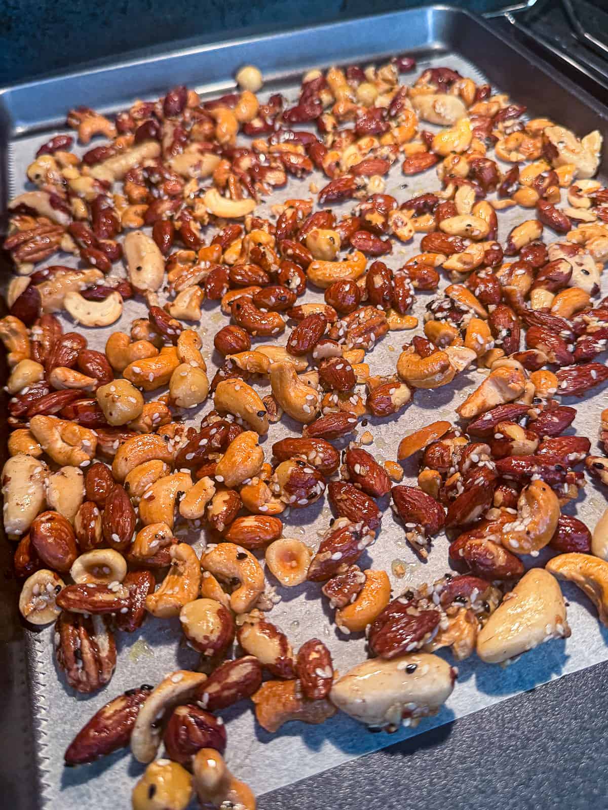 Baking Everything Bagel Spiced Nuts in the oven 