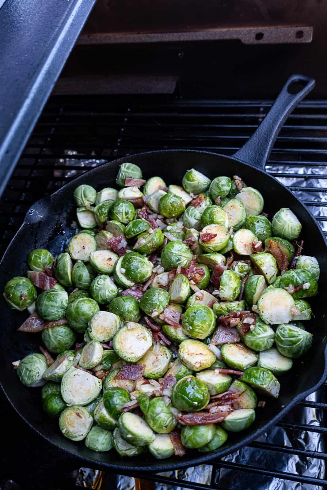 Smoking Brussels Sprouts with Bacon in a Cast Iron Skillet on the Traeger Pellet Grill