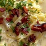 Loaded Baked Potato Soup Recipe with bacon and cheese and herbs with text overlay