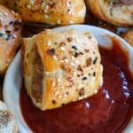 Sausage Pork Rolls with puff pastry recipe with text overlay SipBiteGo