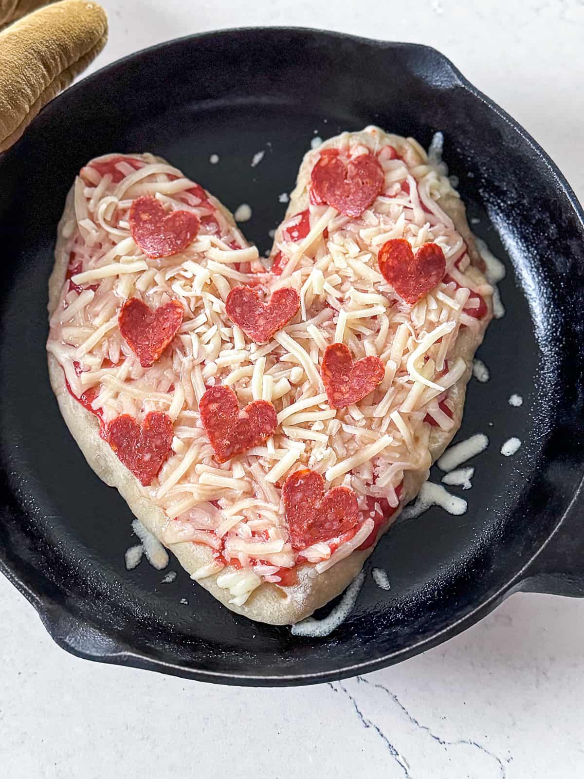 Prepping Valentines Day Heart Pizza with Pepperoni