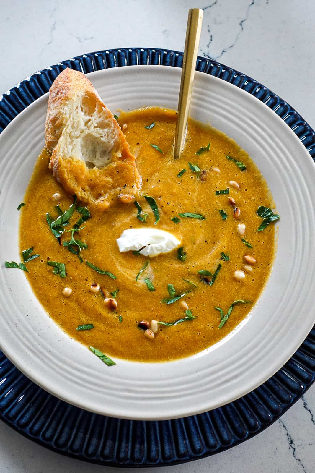 Toasted Pine Nuts Topping on Carrot Soup
