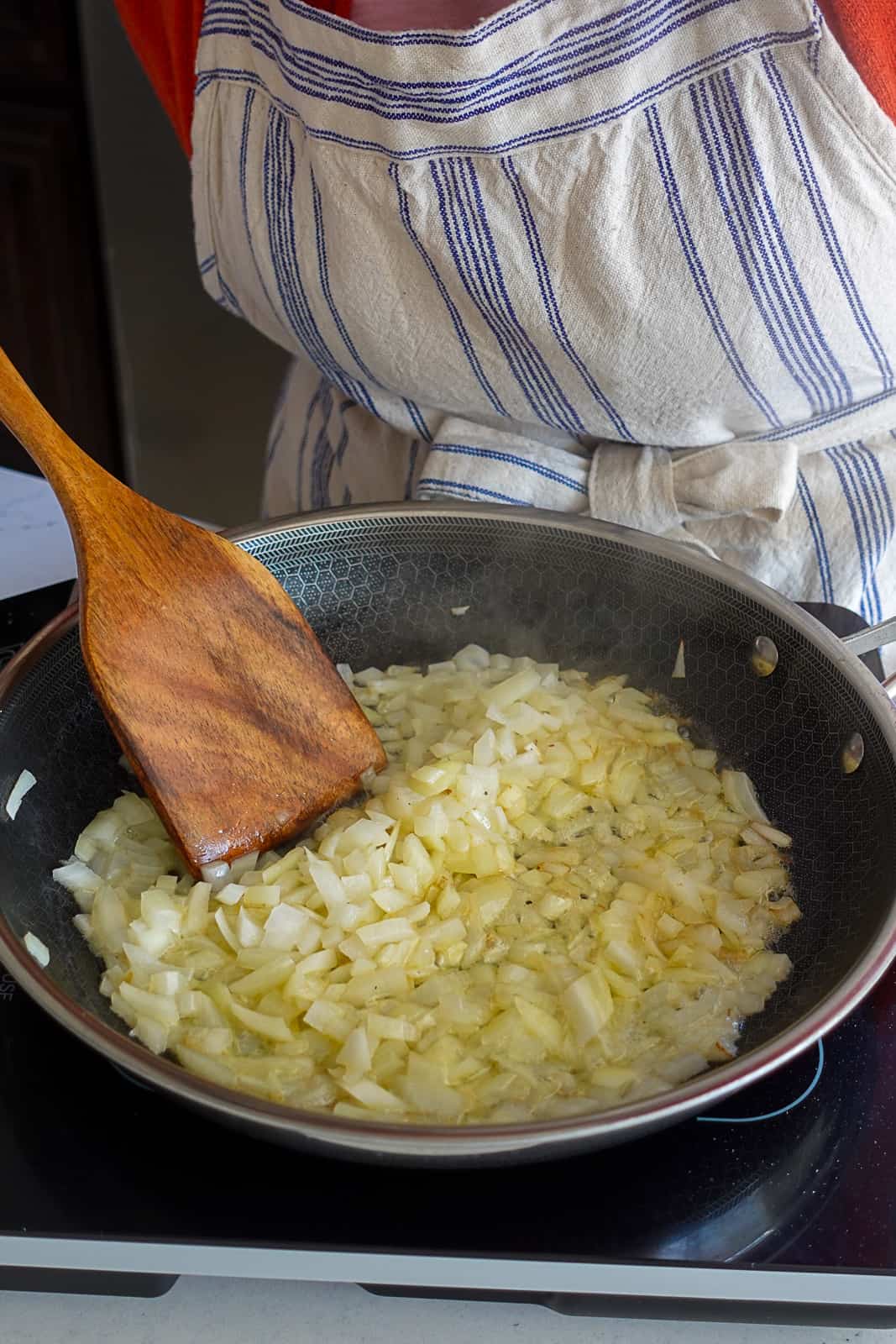 Cooking onions and butter in a pan