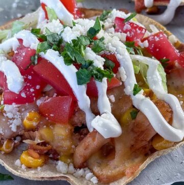 BBQ Chicken Tostadas with sour cream and guacamole