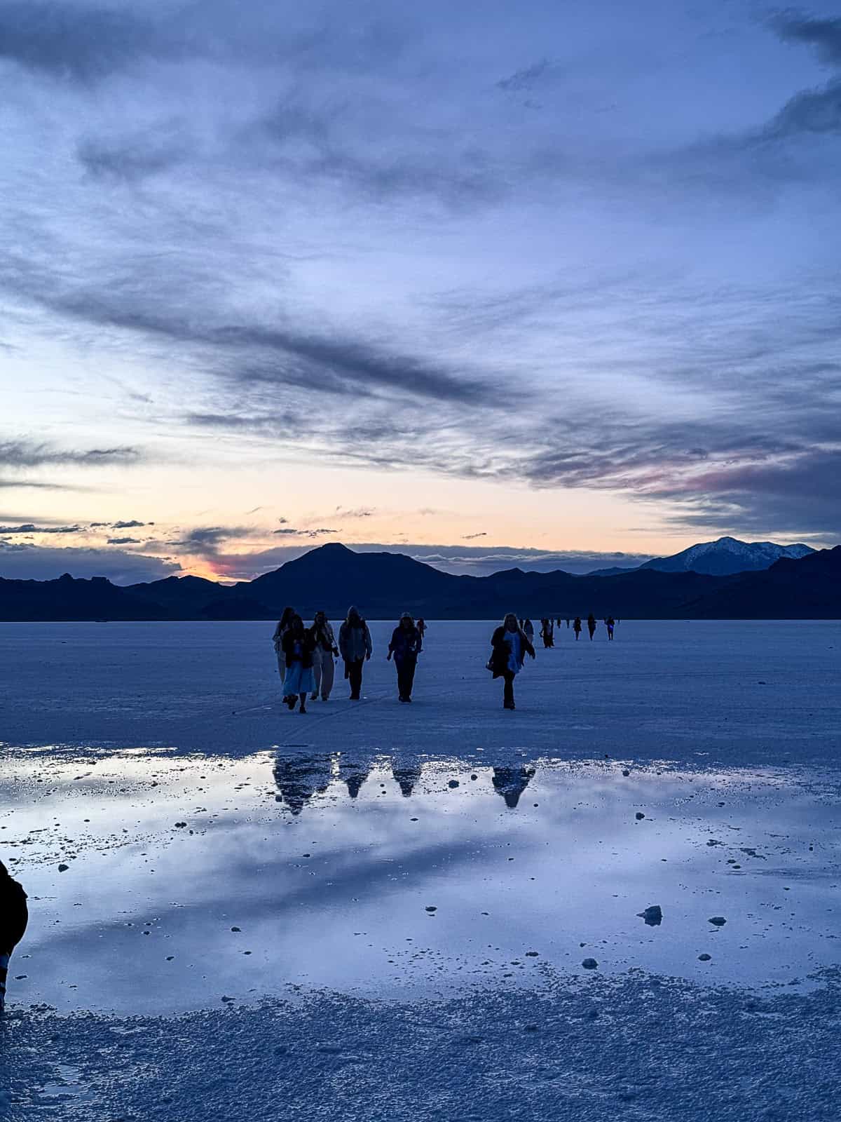 Sunset views of tourists at Utah Bonneville Salt Flats