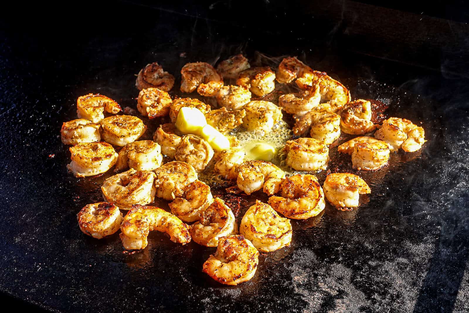 Cooking Shrimp On The Traeger Flatrock Griddle with butter