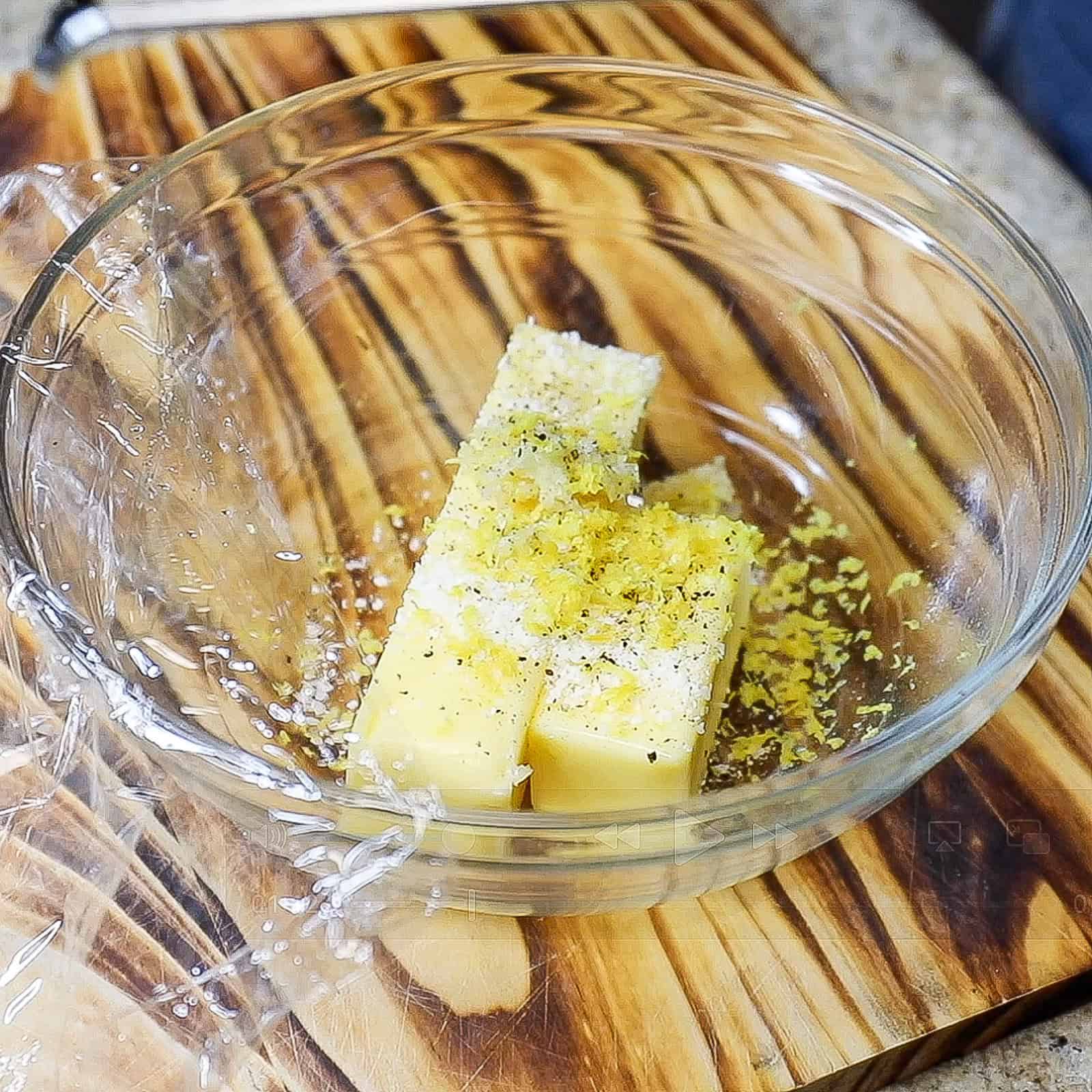 Mixing ingredients for a flavorful butter rub for smoked turkey