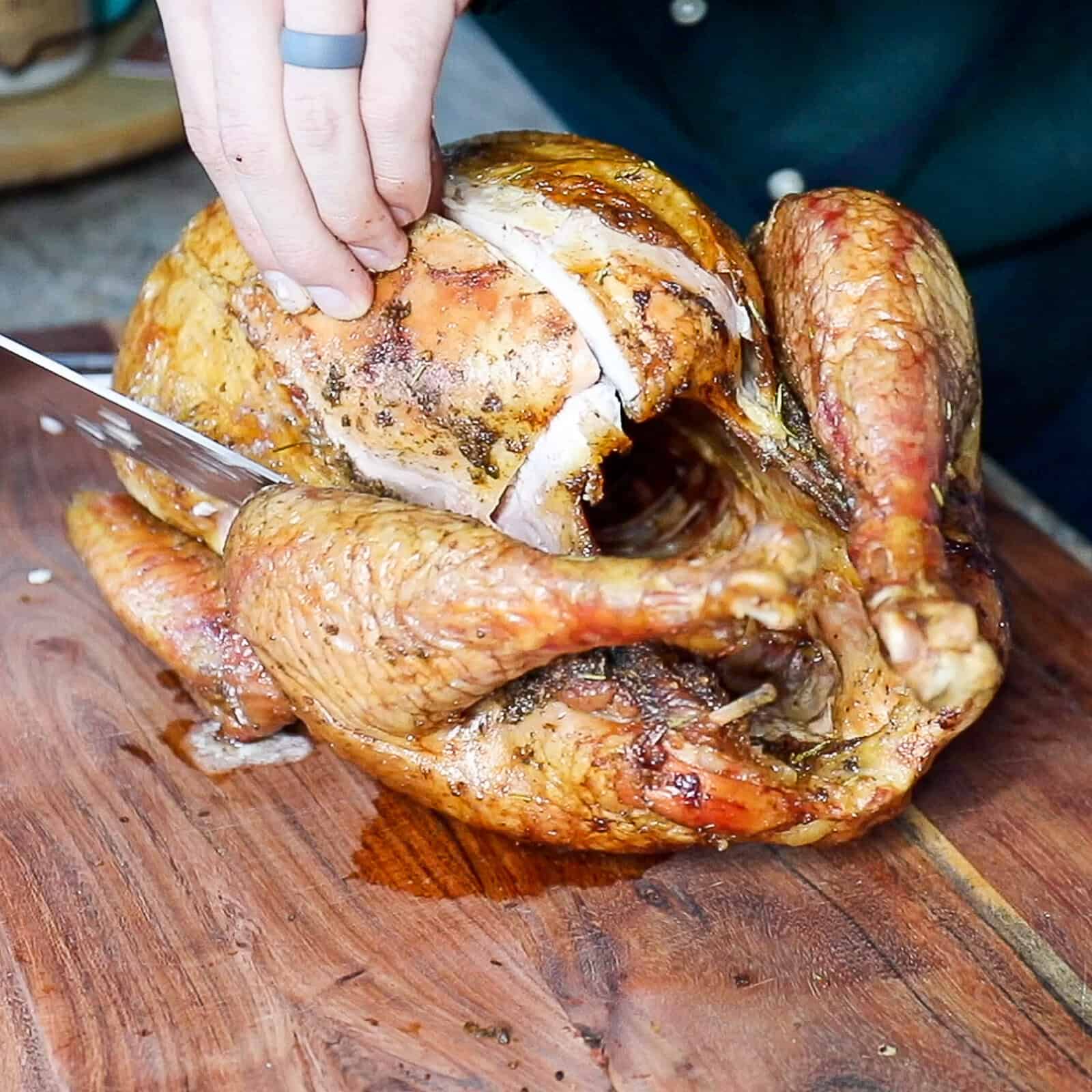 Resting and carving a juicy Traeger smoked whole turkey