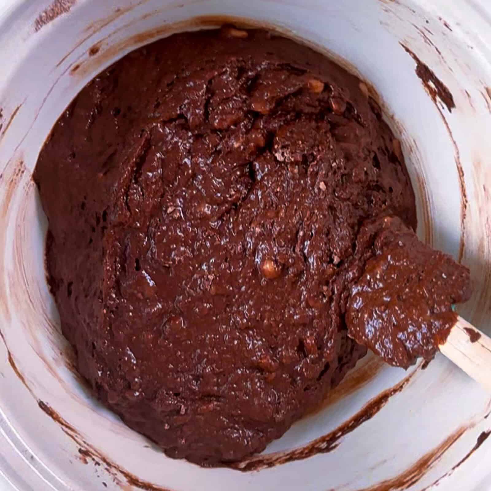 Combining wet and dry mixtures for chocolate banana bread batter