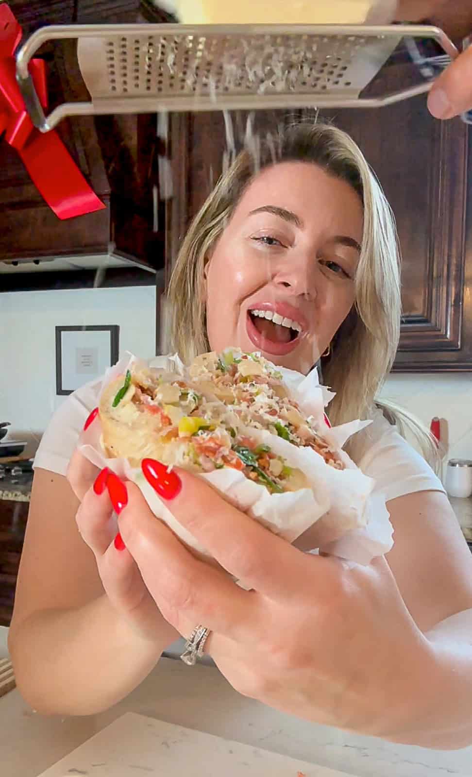 Jenna Passaro Holding Viral Italian Chopped Sandwich Recipe