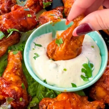 Smoked Wings on the Traeger Pellet Grill, close-up of golden smoked wings cooking on the grill