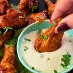 The Best Smoked Wings Recipe on the Traeger with text overlay, graphic showing finished smoked wings