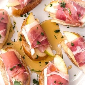 Brie pear and prosciutto crostini appetizer