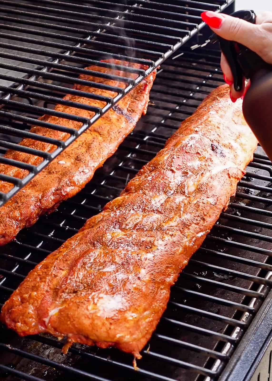 Spritzing BBQ ribs