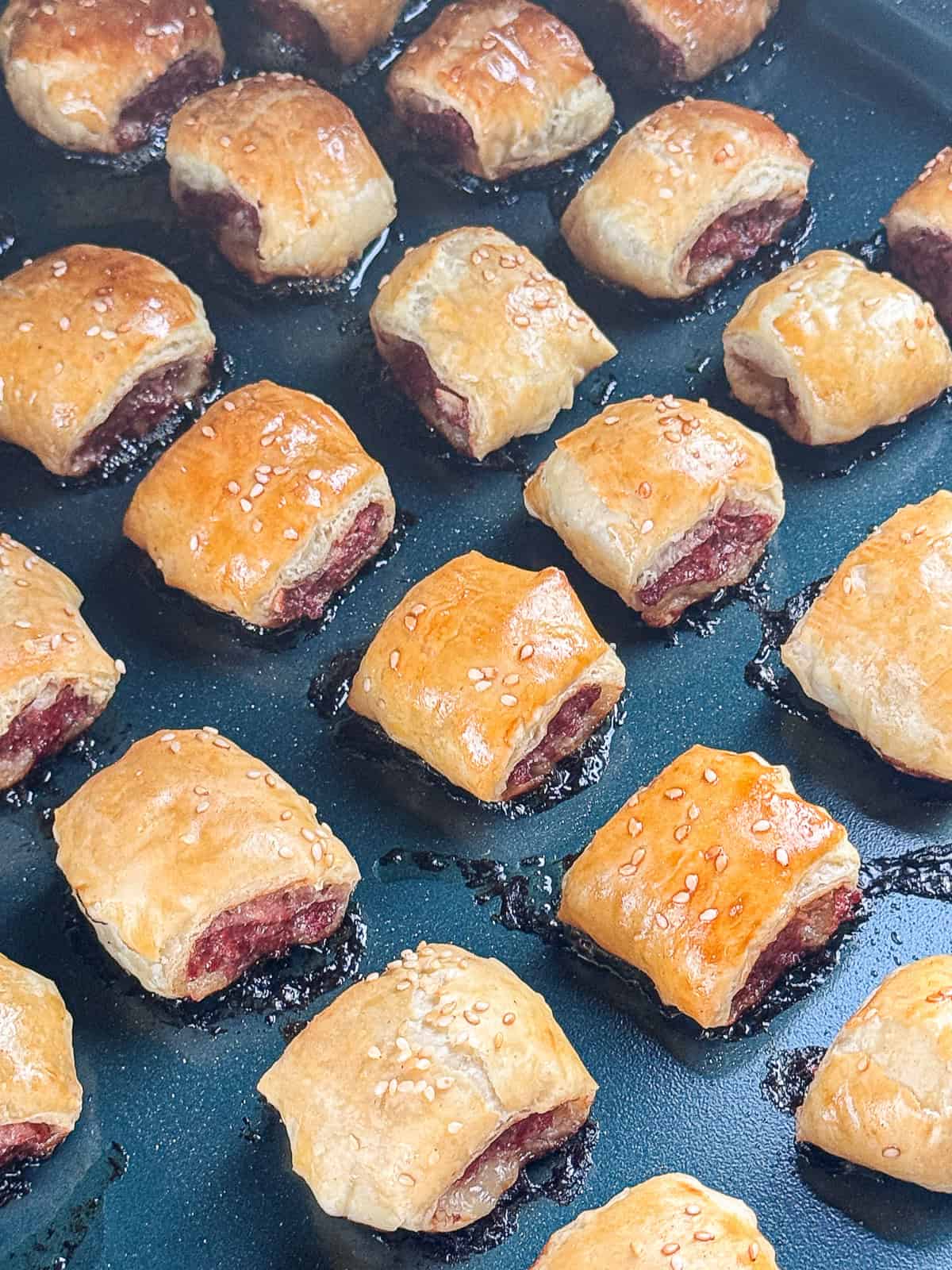 Burger Puff Pastry Bites on a Baking Sheet in the Smoker