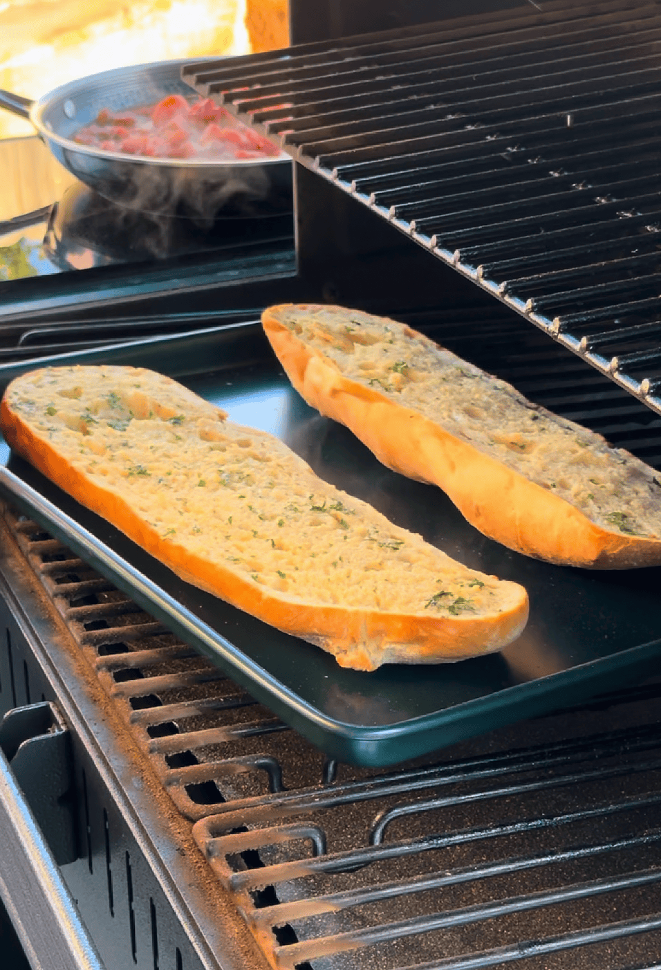 Garlic butter topped French Bread Pizza in Grill