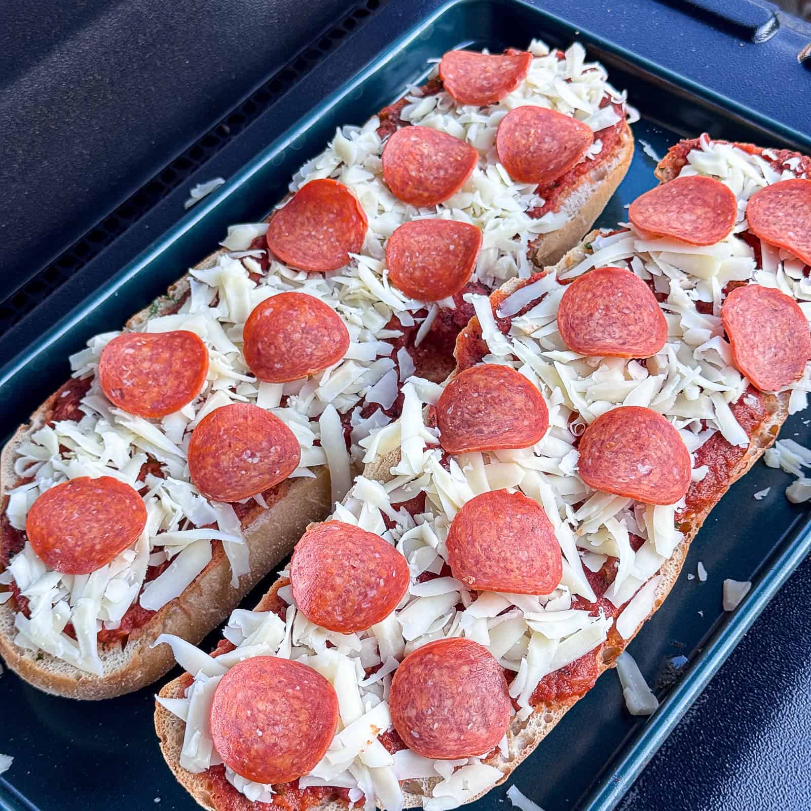 Grilling French Bread Pizza with Mozzarella and Pepperoni