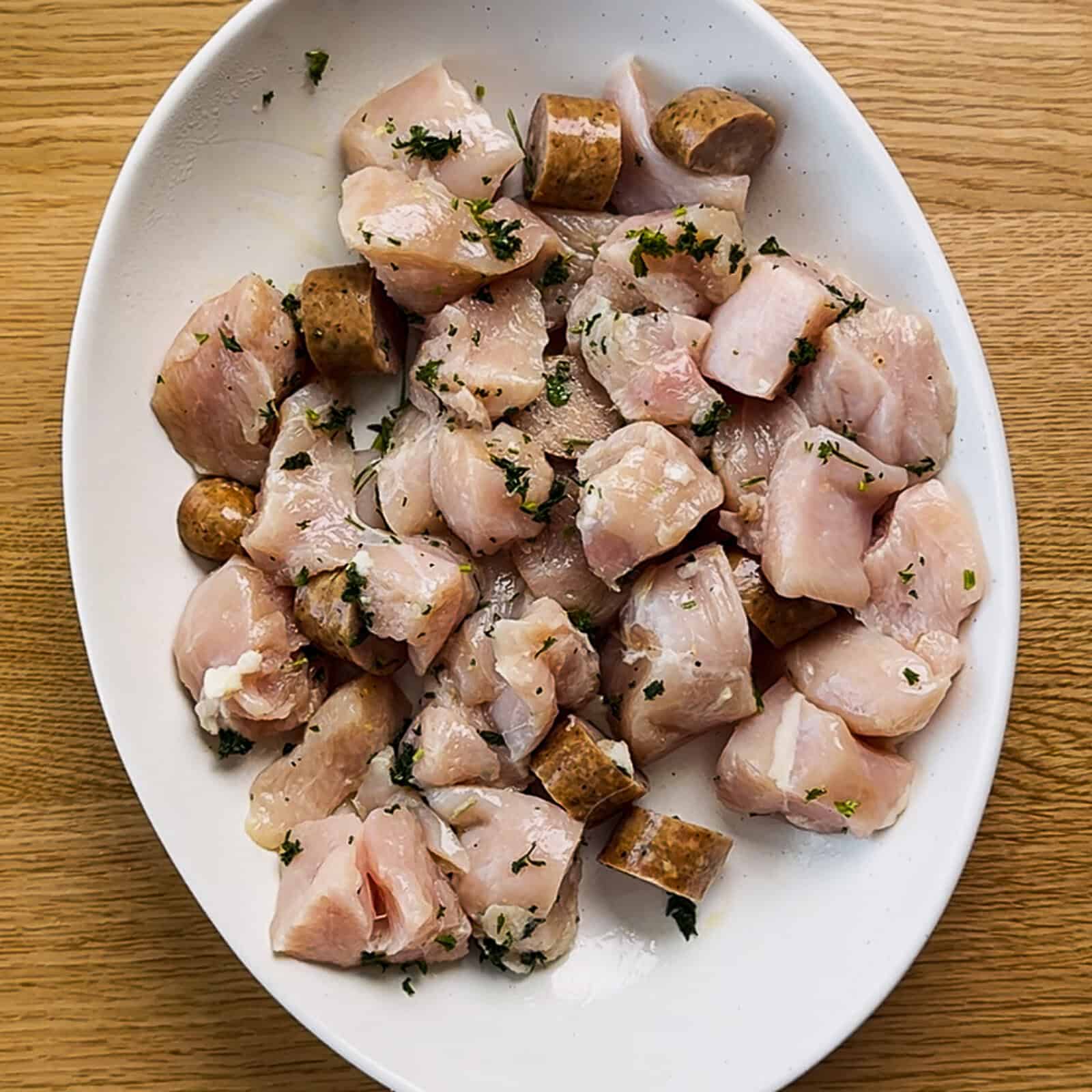 Step 2 Seasoned meat being mixed in a bowl