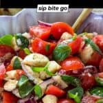 Overhead shot of cherry tomato bruschetta served as a no-bake summer appetizer with fresh ingredients.