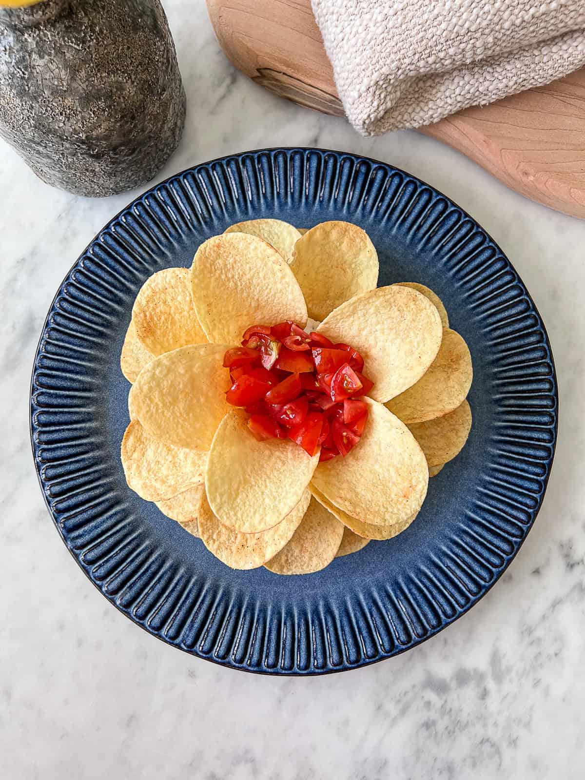 close-up of Boursin cheese and Pringles chips arranged as a flower appetizer