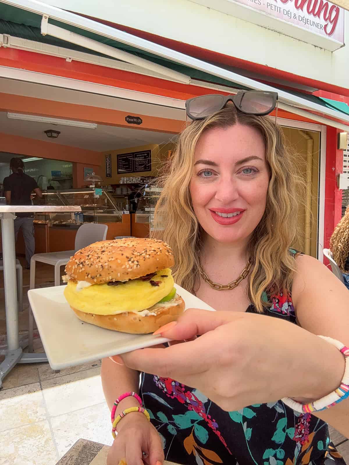 Jenna Passaro enjoying a breakfast sandwich at Good Morning Café near Orient Beach in St. Maarten