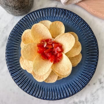 viral Boursin cheese and Pringles flower appetizer on a serving plate