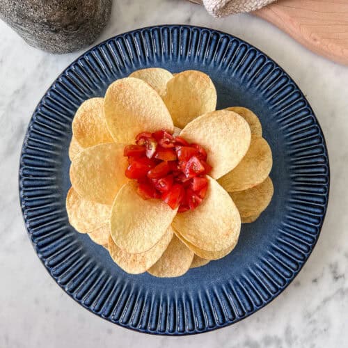 viral Boursin cheese and Pringles flower appetizer on a serving plate