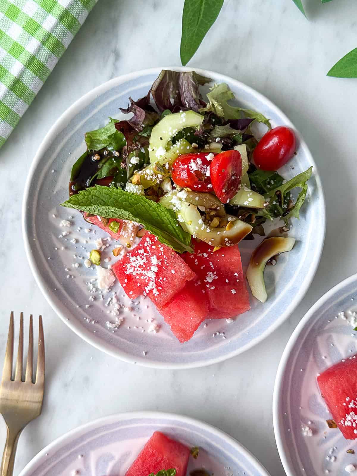 Watermelon appetizer salad with feta and balsamic drizzle