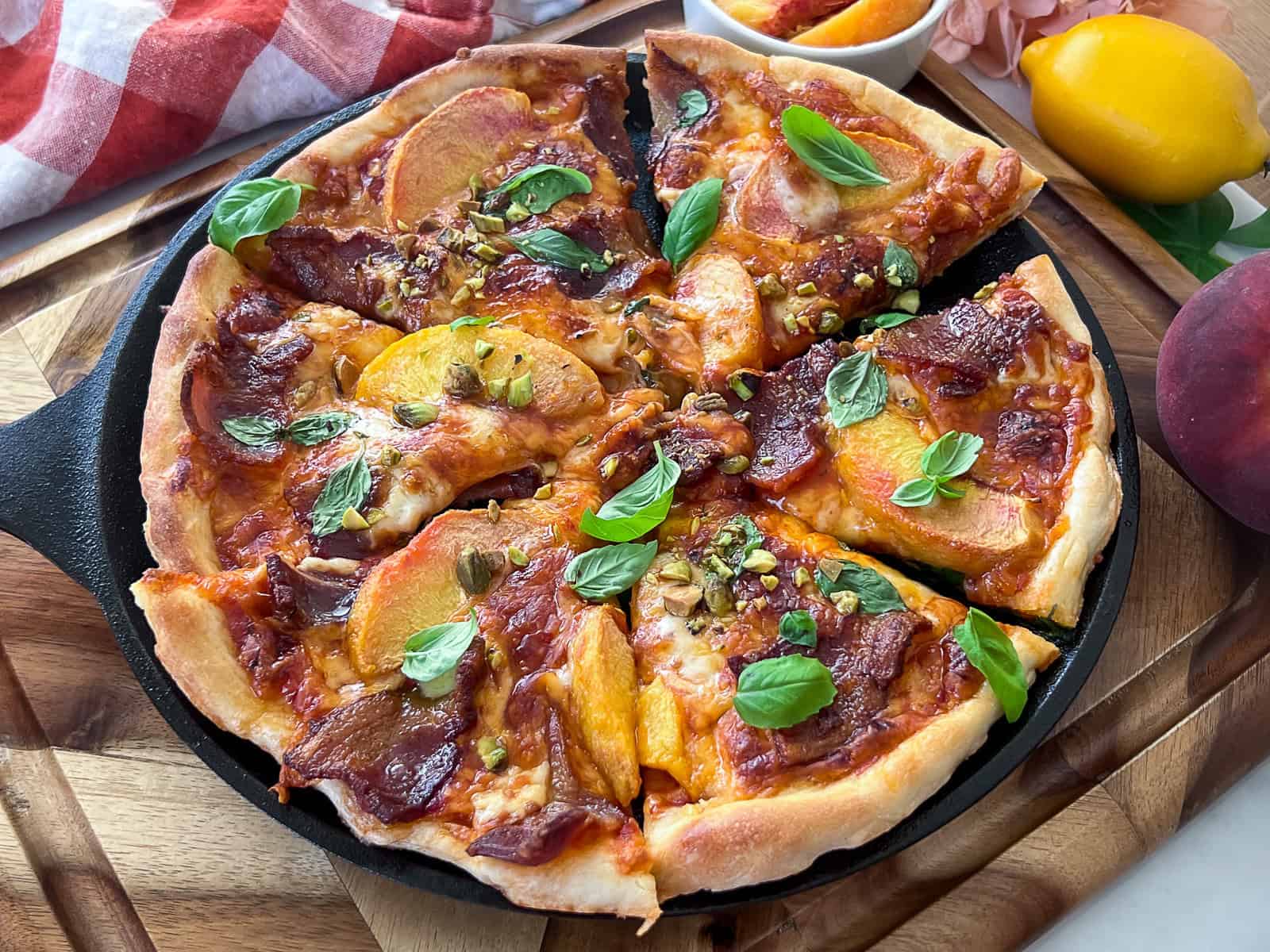 Closeup of homemade peach and bacon pizza