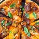 Peach and bacon pizza ready to serve with text overlay