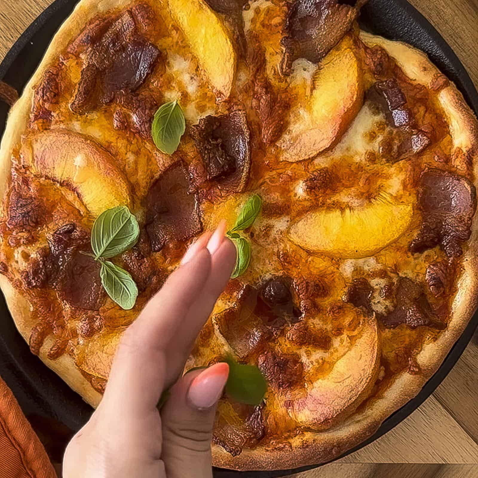 Baked peach and bacon pizza fresh from the oven