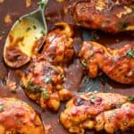 Easy chicken with enchilada sauce tenderloins in a skillet with recipe text overlay