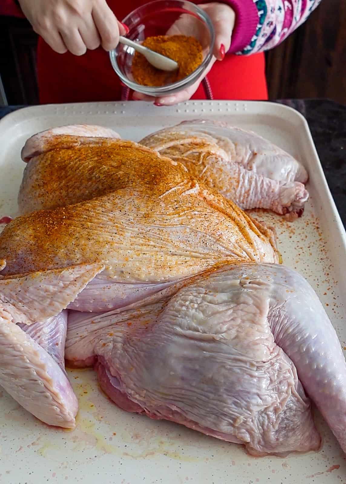 Seasoning spatchcocked turkey with dry rub