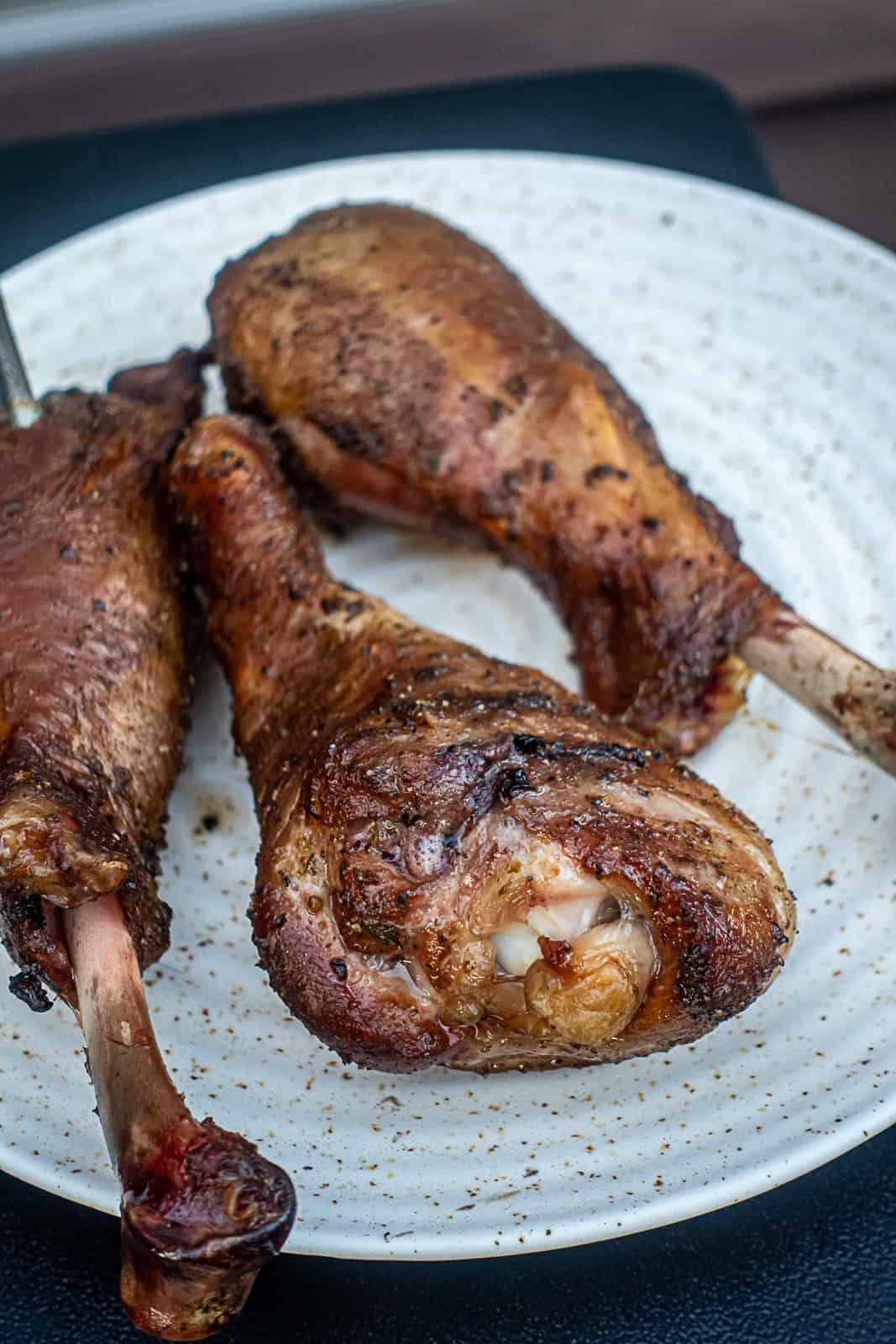 Closeup of Juicy Traeger BBQ smoked turkey legs