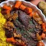 Comfort food dinner of pot roast cooked in enchilada sauce