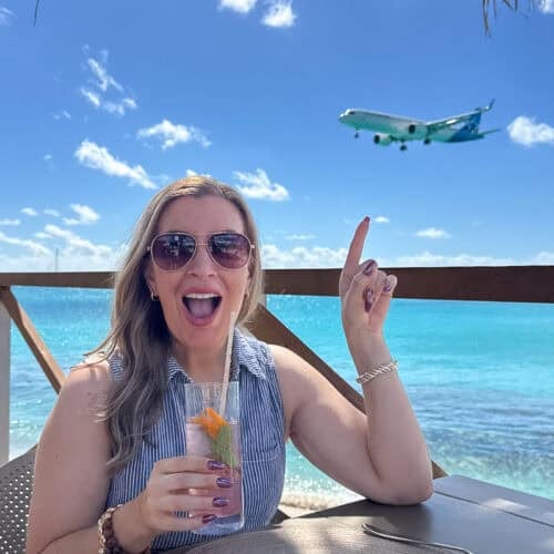 Jenna Passaro plane spotting with kids on Maho Beach in St. Maarten