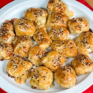 Puff pastry brie and fig bites arranged on a serving platter