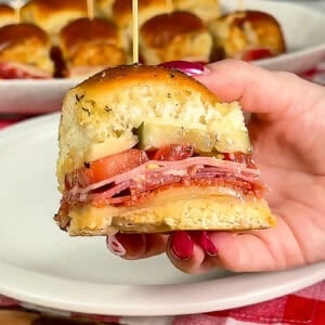 Golden baked pull-apart Italian sub sliders on baking sheet