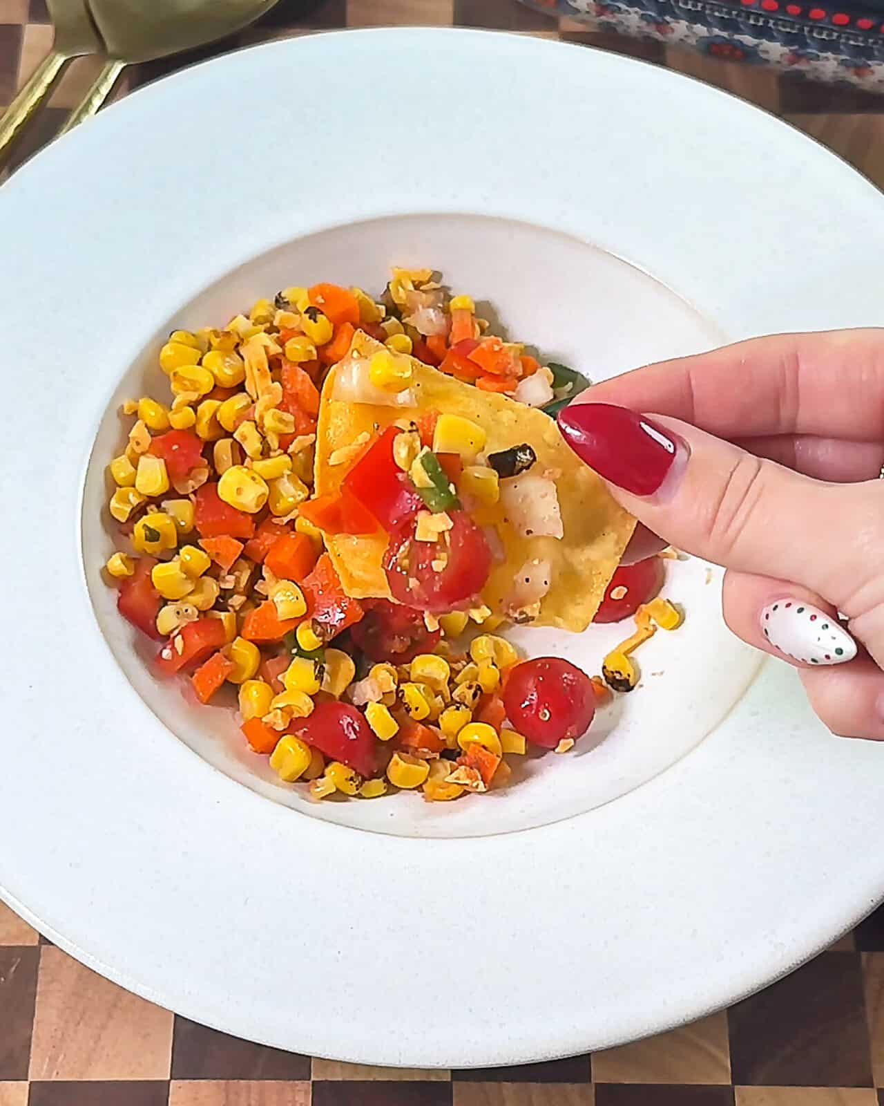 Finished bowl of Make-Ahead Corn Salsa Dip ready to serve