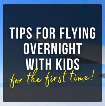Airplane flying above clouds with text overlay: Tips for Flying Overnight With Kids For the First Time