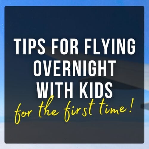 Airplane flying above clouds with text overlay: Tips for Flying Overnight With Kids For the First Time