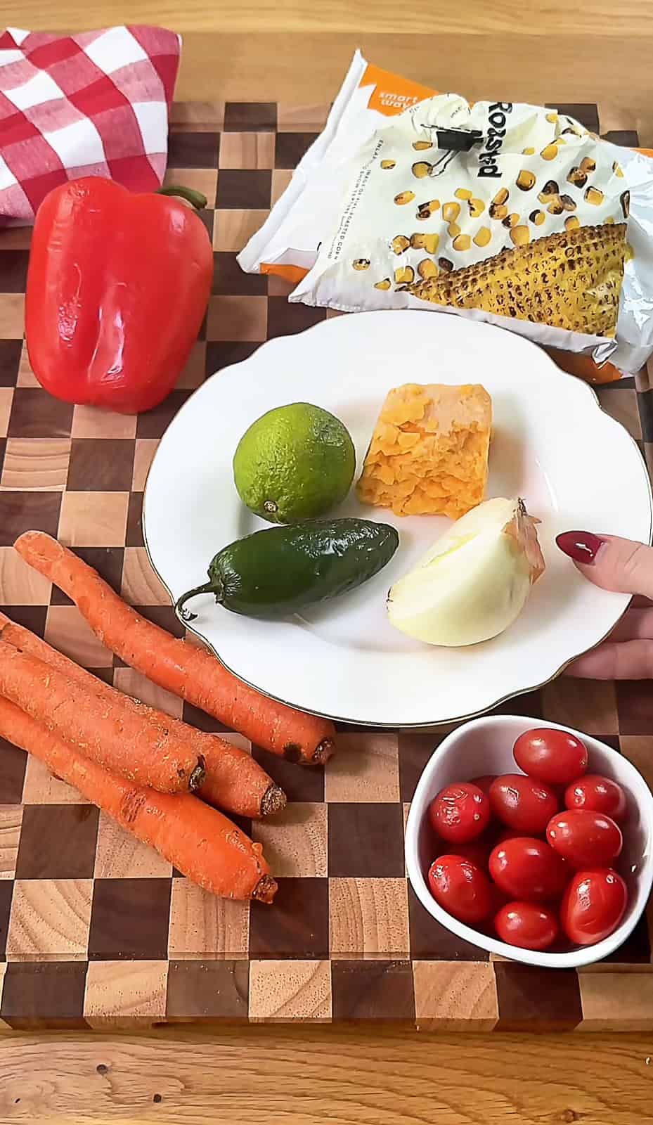 Assorted chopped vegetables ready for Make-Ahead Corn Salsa Dip